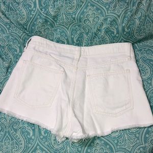 White hi rise shorts
